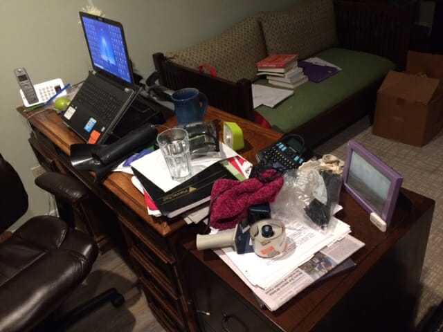 cluttered and disorganized desk